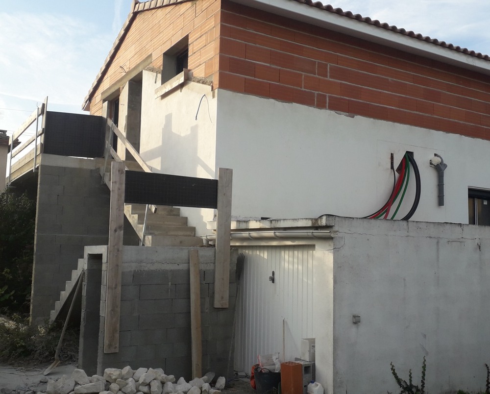 Extension et surélévation d'une maison à Castanet-Tolosan